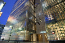 Japan, Honshu, Tokyo, Ginza, nightime view of Hermes Building looking out of alley towards Harumi-dori Avenue.