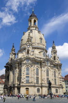 GERMANY, Saxon, Dresden, The restored Baroque church of Frauenkirch Church of Our Lady and surrounding restored buildings in Neumarkt square busy with sightseeing tourists.