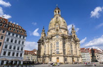 GERMANY, Saxony, Dresden, The restored Baroque church of Frauenkirch Church of Our Lady and surrounding restored buildings in Neumarkt square busy with sightseeing tourists.