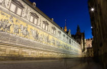 GERMANY, Saxony, Dresden, Frstenzug or Procession of the Dukes illuminated at sunset in Auguststrasse a mural on 25,000 Meissen tiles that depicts 35 noblemen from the 12th century Konrad the Great,...