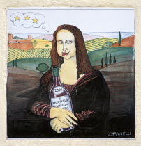 ITALY, Tuscany, Montalcino, Val D'Orcia Painted wall tile of a woman after the Mona Lisa in the Tuscan countryside holding a bottle of Brunello and sticking her tongue out by the artist Giannelli.