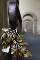 ITALY, Tuscany, Florence, Bunches of locked padlocks used by stallholders in the Vasari Corridor beside the Uffizi gallery.