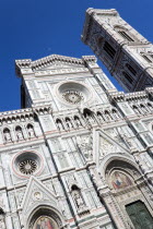 ITALY, Tuscany, Florence, The Neo-Gothic marble west facade of the Cathedral of Santa Maria del Fiore the Duomo and Giotto's Campanile bell tower.