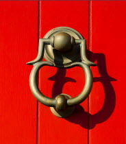 IRELAND, County Dublin, Howth Harbour, Detail of door knocker on lighthouse. 