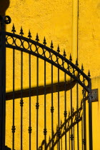 IRELAND, COunty Galway, Connemara, Clifden, Colourful gate and wall. 