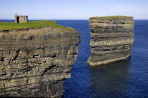 IRELAND, County Mayo, Downpatrick Head, Dn Briste Broken Fort is an impressive sea stack at the headland Standing 50 meters 164 feet high, Dn Briste was once part of the mainland, and connected to i...