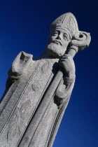 IRELAND, County Mayo, Downpatrick Head, Statue of St Patrick, who prayed frequently in the church.  
