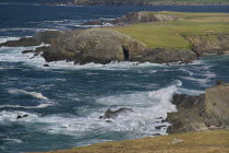 IRELAND, County Kerry, Dingle Peninsula, Crashing waves at Clogher Head. 