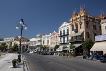 GREECE, North East Aegean, Lesvos, Mitilini, View of main street Kountouriotou by the sea with its distinctive neo classical buildings.