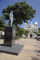 VENEZUELA, Margarita Island, Porlamar, C Vellazquez and C Manno, Simon Bolivars sculpture at Plazza Bolivar Square just in front of the cathedral at Porlamar city, shoot on a bright day with blue sky...