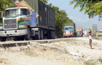 Haiti, Isla de Laganave, Medical aid being transported in large trucks.