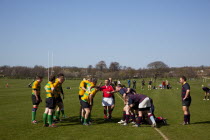 England, West Sussex, Shoreham-by-Sea, Rugby Teams playing on Victoria Park playing fields. Referee setting scrum.