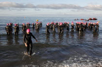 England, West Sussex, Goring-by-Sea, Worthing Triathlon 2009, women at the start of the swim section.