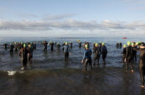 England, West Sussex, Goring-by-Sea, Worthing Triathlon 2009, male competitors at the swim start.