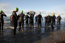 England, West Sussex, Goring-by-Sea, Worthing Triathlon 2009, male competitors at the swim start.