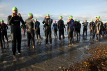 England, West Sussex, Goring-by-Sea, Worthing Triathlon 2009, male competitors at the swim start.