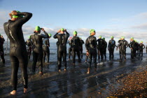 England, West Sussex, Goring-by-Sea, Worthing Triathlon 2009, male competitors at the swim start.