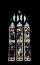 England, West Sussex, East Grinstead, Details of the staiined glass windows in Church of St Swithun.