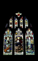 England, West Sussex, East Grinstead, Details of the stained glass windows in Church of St Swithun.