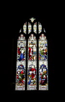 England, West Sussex, East Grinstead, Details of the stained glass windows in Church of St Swithun.