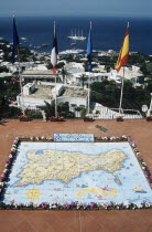 Italy, Campania, Capri, Map of Capri made from ceramic tiles, on a balcony, Marina Grande behind.