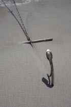 Malaysia, Pulau Perhentian Kecil Coast, Terrengganu, Anchor with a stretched chain stuck in the sand.