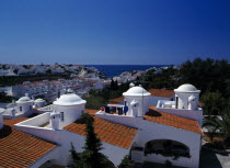 Portugal, Algarve, Carvoeiro, View over town toward sea from Colina Branca Apartments.