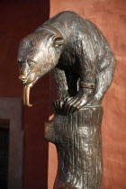 Poland, Wroclaw, replica of E. M. Geygers fountain with bronze cast bear, superstitious tourist should touch the nose for good luck.