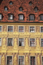 Poland, Wroclaw, detail of building facade with tromp l'oiel painted mural in the Rynek old town square.