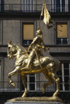 France, Ile de France, Paris, Gilded golden bronze statue of Joan of Arc on horseback in armour carrying her standard by Fremiet in Place des Pyramids in the Tuileries Quarter a focus of pilgrimage fo...