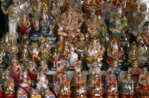 Thailand, North, Chiang Mai, Display of Hindu religious figurines of gods for sale in a shop.