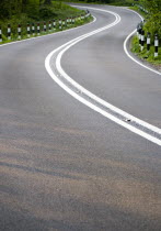 Transport, Roads, Country, A283 Washington Road single carriageway road with double white lines in the centre bending around a corner.