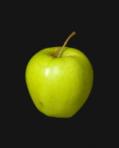 Food, Fruit, Apples, One single ripe green apple against a black background.