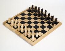 Toys, Games, Board Games, Chess board with pieces laid out for start of game against a white background.