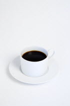 Drinks, Hot, Coffee, Cup and saucer of hot black coffee on white background.