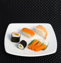 Food, Sushi, Meal, Sushi plate with rice wrapped in seaweed and seafood and fish selection.