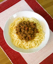 Food, Cooked, Pasta, Spaghetti Bolognese in a bowl on a table.
