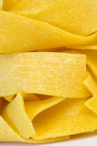 Food, Uncooked, Pasta, Ribbons of durum wheat Pappardelle against a white background.