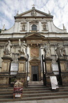 Poland, Krakow, Church of St Peter & St Paul with statues of the apostles in the foreground.