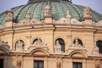 Poland, Krakow, Dome & gargoyles of the Juliusz Slowacki Theatre.