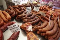 Poland, Krakow, display of cold meats in Stary Kleparz market.