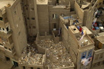 Environment, Litter, Aerial view looking down on building rooftops covered in rubbish in Cairo, Egypt.