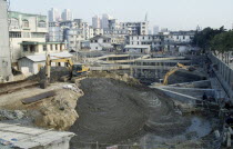 China, Guangdong, Shenzen, Building construction site. 