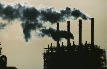 Environment, Pollution, Factory omitting plumes of smoke from chimneys in Santiago, Chile.