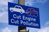 Environment, Air, Pollution, Sign asking motorists to switch of engines at railway level crossing.
