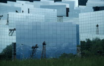 France, Languedoc Roussillon, Pyrenees Orientales, Odeillo-Via solar power station.  Mirrors reflecting light back to station building.