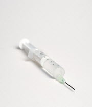 Health, Medicine, Medical Instruments, Hypodermic syringe with needle on a white background.