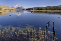 Ireland, County Donegal, Gweedore, Mount Errigal seen across lake.