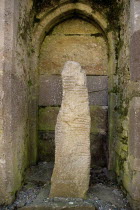 Ireland, County Waterford, Ardmore Monastic Site, Ogham Stone in the Cathedral.