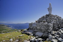 Ireland, County Mayo, Achill Island, Minaun Cliffs, Statue of Blessed Virgin Mary on summit of the cliffs.